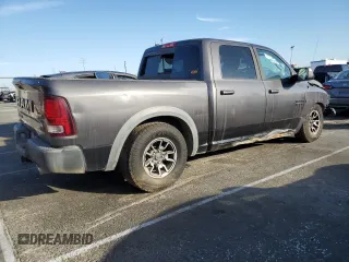 2016 Ram 1500 Rebel z VIN 1C6RR7YT6GS211830, wystawiony jako Copart lot #54072485 z przebiegiem 56 512 mil mil oraz Szkody całkowita. Historia ofert i sprzedaży dostępna na DreamBid. Obrazek 3.