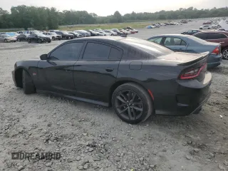 2019 Dodge Charger Scat Pack z VIN 2C3CDXGJ7KH697176, wystawiony jako Copart lot #53702845 z przebiegiem 76 988 mil mil oraz Szkoda całkowita • Salvage title. Historia ofert i sprzedaży dostępna na DreamBid. Obrazek 2.