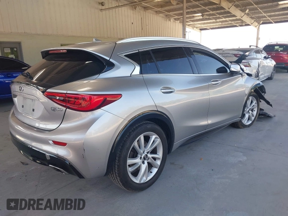 2018 Infiniti QX30 Pure with VIN SJKCH5CPXJA002505, listed as a IAAI auction lot 42276620 with 90,555 mi miles and . Bid and sale history available at DreamBid. Image 4.