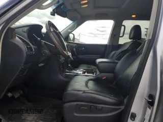 2016 Infiniti QX80 with VIN JN8AZ2NF5G9610490, listed as a Copart auction lot 60041325 with 131,253 mi miles and Salvage title. Bid and sale history available at DreamBid. Image 7.