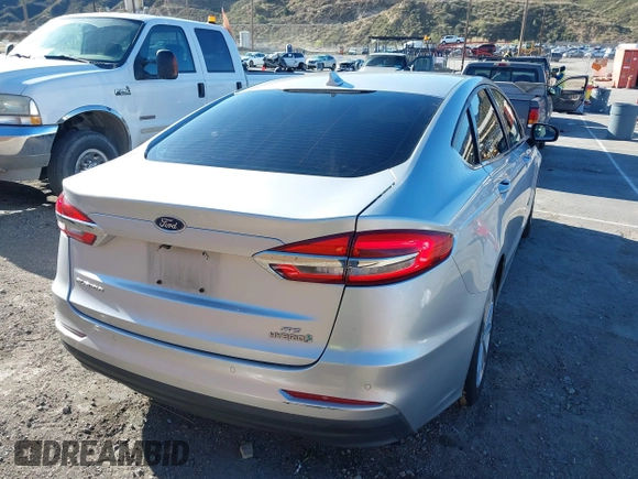 2019 Ford Fusion SE with VIN 3FA6P0LUXKR208139, listed as a IAAI auction lot 41820958 with 66,609 mi miles and . Bid and sale history available at DreamBid. Image 4.