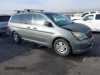 2007 Honda Odyssey EX-L z VIN 5FNRL38707B089954, wystawiony jako IAAI lot #41410866 z przebiegiem 221 791 mil mil oraz . Historia ofert i sprzedaży dostępna na DreamBid. Obrazek 1.