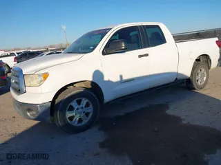 2011 Toyota Tundra 2WD Truck with VIN 5TFRM5F13BX034050, listed as a IAAI auction lot 41385328 with 172,721 mi miles. Bid and sale history available at carsss.com. Image 18.