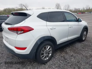 2018 Hyundai Tucson SE with VIN KM8J23A46JU625168, listed as a IAAI auction lot 41877146 with 152,572 mi miles. Bid and sale history available at carsss.com. Image 4.