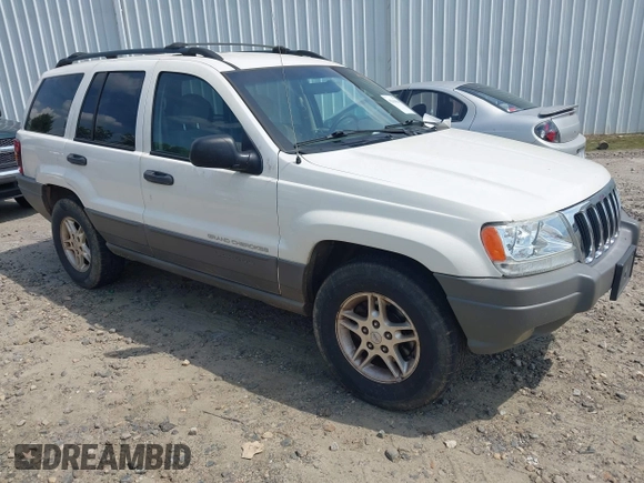 2003 Jeep Grand Cherokee Laredo z VIN 1J4GX48S33C519404, wystawiony jako IAAI lot #42164364 z przebiegiem 174 627 mil mil oraz . Historia ofert i sprzedaży dostępna na DreamBid. Obrazek 1.