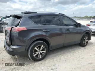 2018 Toyota RAV4 XLE with VIN JTMWFREV1JJ742694, listed as a Copart auction lot 51093695 with 74,502 mi miles and Salvage Title. Bid and sale history available at DreamBid. Image 3.