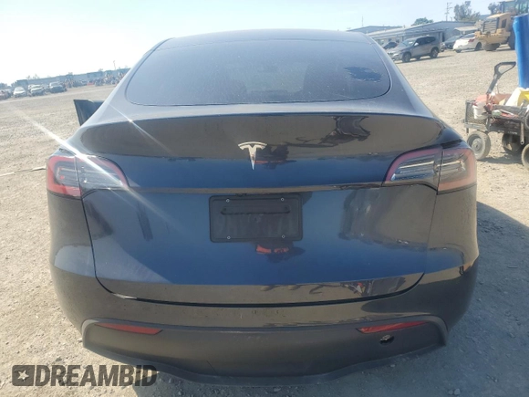2024 Tesla Model Y с VIN 7SAYGDED2RF100152, выставлен на аукционе Copart как лот 52133535 с пробегом 7 632 миль миль и Списание • Salvage title. История ставок и продаж доступна на DreamBid. Изображение 6.