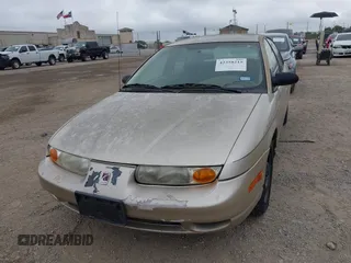 2002 Saturn SL z VIN 1G8ZK52732Z131361, wystawiony jako IAAI lot #42358215 z przebiegiem 228 184 mil mil oraz . Historia ofert i sprzedaży dostępna na DreamBid. Obrazek 6.