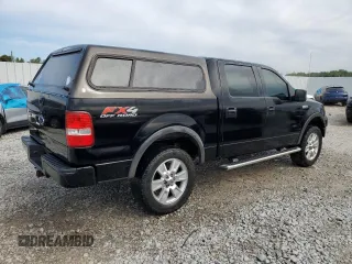 2004 Ford F-150 XLT with VIN 1FTPW145X4KC95658, listed as a Copart auction lot 71197604 with 219,018 mi miles and Salvage Title. Bid and sale history available at carsss.com. Image 3.
