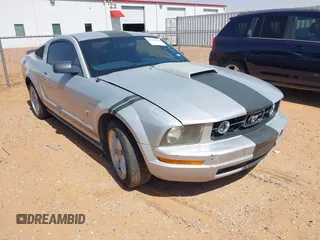2007 Ford Mustang Deluxe z VIN 1ZVFT80N575247116, wystawiony jako IAAI lot #42704286 z przebiegiem 169 931 mil mil oraz . Historia ofert i sprzedaży dostępna na DreamBid. Obrazek 1.