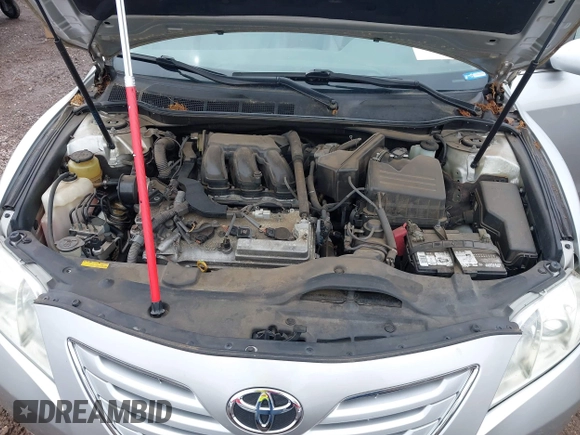 2009 Toyota Camry LE z VIN 4T1BK46K49U592233, wystawiony jako IAAI lot #42205847 z przebiegiem 141 226 mil mil oraz . Historia ofert i sprzedaży dostępna na DreamBid. Obrazek 10.