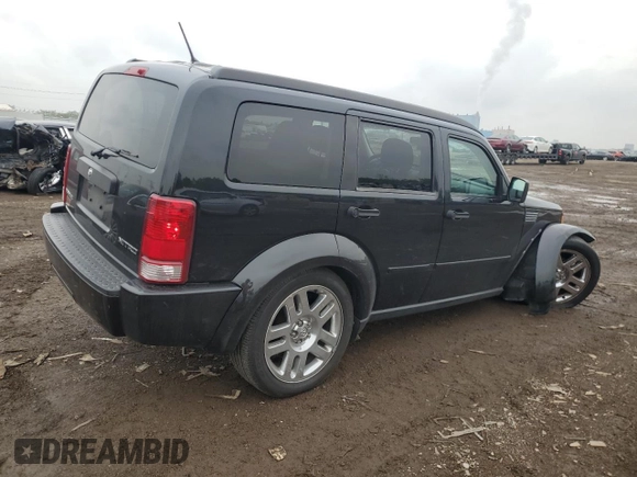 2011 Dodge Nitro Heat with VIN 1D4PT4GK7BW597557, listed as a Copart auction lot 58973335 with 180,958 mi miles and Salvage title. Bid and sale history available at DreamBid. Image 3.