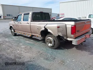 1997 Ford F-350 z VIN 1FTJW35G7VEC80262, wystawiony jako IAAI lot #38286107 z przebiegiem 158 206 mil mil oraz . Historia ofert i sprzedaży dostępna na DreamBid. Obrazek 14.