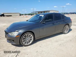 2015 BMW 3 Series 328i with VIN WBA3C1C56FP852660, listed as a Copart auction lot 61518185 with 95,327 mi miles and Salvage title. Bid and sale history available at DreamBid. Image 1.
