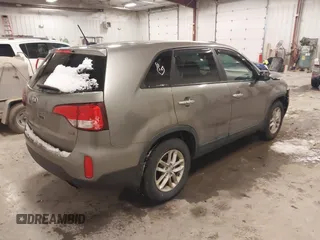 2014 Kia Sorento LX with VIN 5XYKT3A6XEG545998, listed as a IAAI auction lot 41351003 with 153,668 mi miles. Bid and sale history available at carsss.com. Image 4.