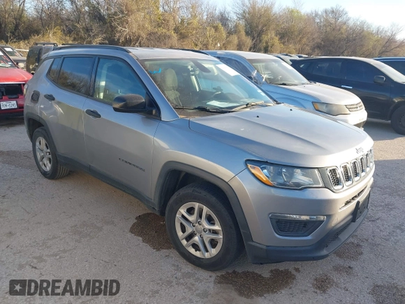 2018 Jeep Compass Sport with VIN 3C4NJCAB0JT124875, listed as a IAAI auction lot 41809953 with 136,018 mi miles. Bid and sale history available at carsss.com. Image 1.