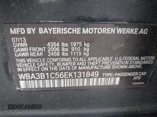 2014 BMW 3 Series 320i with VIN WBA3B1C56EK131849, listed as a IAAI auction lot 42018005 with 215,765 mi miles. Bid and sale history available at carsss.com. Image 9.