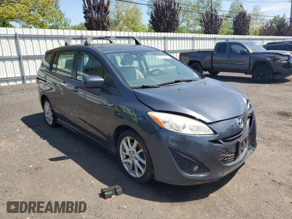 2012 Mazda 5 Grand Touring with VIN JM1CW2DLXC0121134, listed as a Copart auction lot 56539825 with 130,962 mi miles and Salvage title. Bid and sale history available at DreamBid. Image 4.