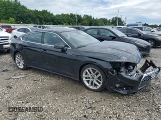 2023 Audi A5 Sportback S line Premium z VIN WAUDACF59PA061867, wystawiony jako Copart lot #56488854 z przebiegiem 22 437 mil mil oraz Szkoda całkowita • Salvage title. Historia ofert i sprzedaży dostępna na DreamBid. Obrazek 4.