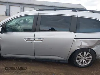 2014 Honda Odyssey EX-L with VIN 5FNRL5H65EB096544, listed as a IAAI auction lot 41903451 with 99,628 mi miles and . Bid and sale history available at carsss.com. Image 14.
