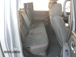 2024 Nissan Frontier Pro-X z VIN 1N6ED1EJ7RN619600, wystawiony jako Copart lot #74284664 z przebiegiem 19 786 mil mil oraz Szkoda całkowita • Salvage title. Historia ofert i sprzedaży dostępna na DreamBid. Obrazek 10.