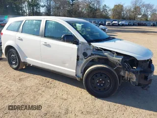 2014 Dodge Journey American Value Pkg with VIN 3C4PDCAB1ET132604, listed as a IAAI auction lot 41693211 with 129,718 mi miles. Bid and sale history available at carsss.com. Image 1.
