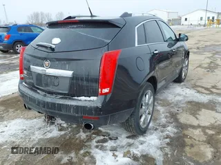 2011 Cadillac SRX Premium Collection with VIN 3GYFNFEY4BS505185, listed as a IAAI auction lot 41599817 with 211,836 mi miles. Bid and sale history available at carsss.com. Image 4.