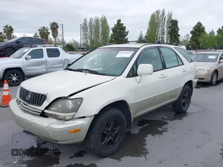 2000 Lexus RX 300 with VIN JT6HF10U4Y0098365, listed as a IAAI auction lot 42068926 with 216,582 mi miles. Bid and sale history available at carsss.com. Image 6.