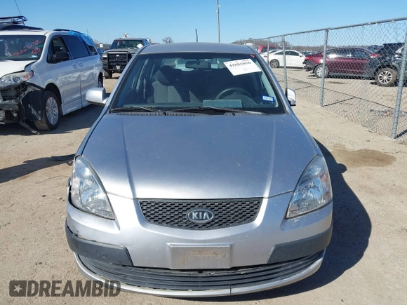 2009 Kia Rio LX with VIN KNADE243596530314, listed as a IAAI auction lot 41681050 with 114,831 mi miles. Bid and sale history available at carsss.com. Image 12.
