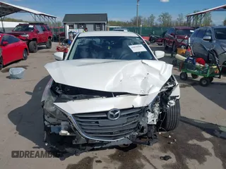 2014 Mazda 3 i Touring with VIN JM1BM1V78E1156409, listed as a IAAI auction lot 42039966 with 123,601 mi miles and . Bid and sale history available at DreamBid. Image 13.