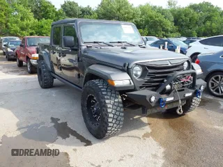 2022 Jeep Gladiator Texas Trail with VIN 1C6HJTAG0NL143489, listed as a IAAI auction lot 42073343 with 75,835 mi miles. Bid and sale history available at carsss.com. Image 1.