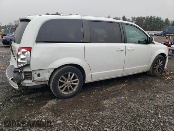 2018 Dodge Grand Caravan SXT z VIN 2C4RDGCG9JR133702, wystawiony jako Copart lot #85824554 z przebiegiem 140 881 mil mil oraz Szkoda całkowita • Salvage title. Historia ofert i sprzedaży dostępna na DreamBid. Obrazek 3.
