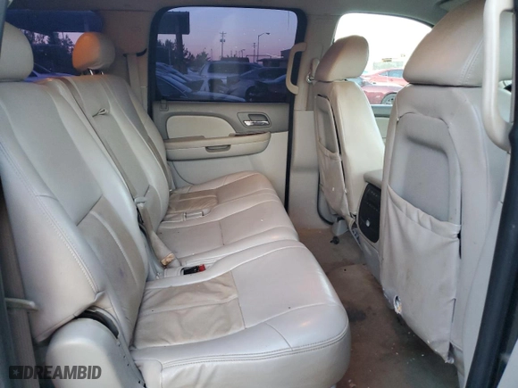 2009 Chevrolet Suburban LT w/2LT with VIN 1GNFC26069R230517, listed as a Copart auction lot 75304014 with 360,939 mi miles and Salvage Title. Bid and sale history available at carsss.com. Image 10.