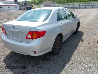 2009 Toyota Corolla with VIN 1NXBU40E49Z017630, listed as a IAAI auction lot 42204714 with 176,828 mi miles. Bid and sale history available at carsss.com. Image 4.