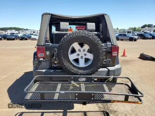 2007 Jeep Wrangler Sahara z VIN 1J4FA54177L183617, wystawiony jako Copart lot #49660785 z przebiegiem 178 846 mil mil oraz Szkoda całkowita • Salvage title. Historia ofert i sprzedaży dostępna na DreamBid. Obrazek 6.