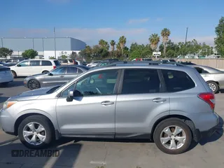 2014 Subaru Forester Premium with VIN JF2SJAEC5EH551632, listed as a IAAI auction lot 42640444 with 240,591 mi miles and . Bid and sale history available at DreamBid. Image 14.