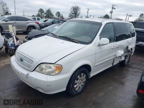 2004 Kia Sedona LX with VIN KNDUP131446537660, listed as a IAAI auction lot 41526183 with 282,891 mi miles. Bid and sale history available at carsss.com. Image 2.