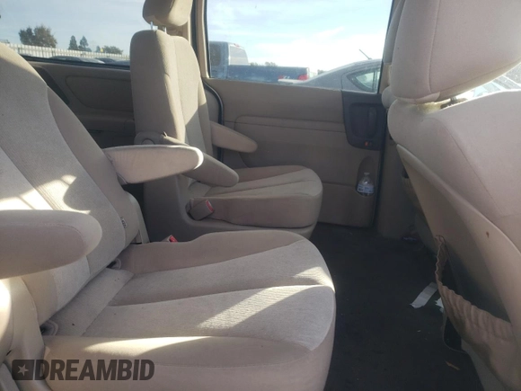 2011 Kia Sedona LX with VIN KNDMG4C74B6370803, listed as a Copart auction lot 77228344 with 142,394 mi miles and Salvage Title. Bid and sale history available at DreamBid. Image 11.