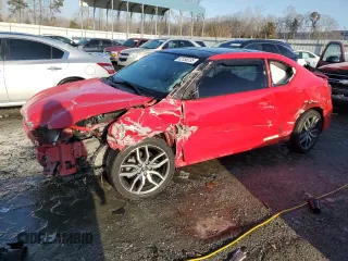 2014 Scion tC with VIN JTKJF5C75E3080967, listed as a Copart auction lot 42158235 with 133,733 mi miles and Salvage Title. Bid and sale history available at carsss.com. Image 1.