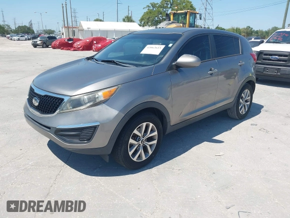 2014 Kia Sportage LX with VIN KNDPB3AC7E7595527, listed as a IAAI auction lot 42062615 with 64,777 mi miles. Bid and sale history available at carsss.com. Image 2.