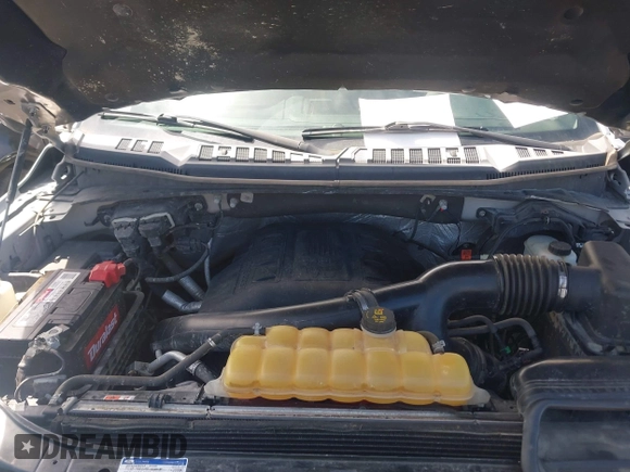 2015 Ford F-150 XLT with VIN 1FTEW1EG5FFA40936, listed as a IAAI auction lot 42011697 with 199,722 mi miles. Bid and sale history available at carsss.com. Image 10.