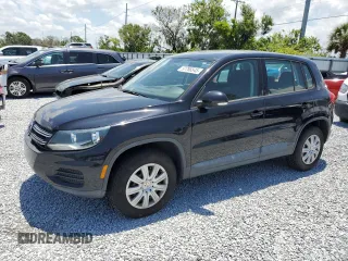 2014 Volkswagen Tiguan z VIN WVGCV3AX8EW625094, wystawiony jako Copart lot #57768545 z przebiegiem 104 000 mil mil oraz Czysty tytuł • Clean title. Historia ofert i sprzedaży dostępna na DreamBid. Obrazek 1.