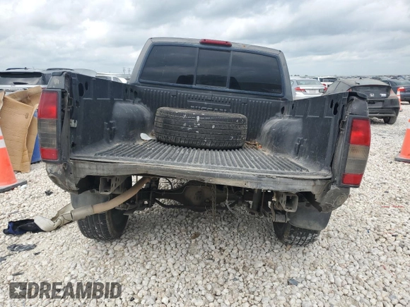 2000 Nissan Frontier XE with VIN 1N6ED27T3YC348002, listed as a Copart auction lot 54538235 with 289,922 mi miles and Salvage title. Bid and sale history available at DreamBid. Image 6.