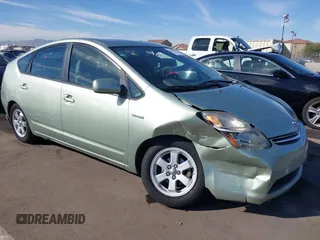 2007 Toyota Prius z VIN JTDKB20U473255132, wystawiony jako IAAI lot #41653909 z przebiegiem 259 816 mil mil oraz . Historia ofert i sprzedaży dostępna na DreamBid. Obrazek 1.