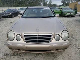 2001 Mercedes-Benz E-Class with VIN WDBJH65J41B312277, listed as a Copart auction lot 70261594 with 123,702 mi miles and Clean Title. Bid and sale history available at carsss.com. Image 5.