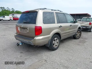 2003 Honda Pilot EX with VIN 2HKYF18563H526678, listed as a IAAI auction lot 41821187 with 412,622 mi miles and . Bid and sale history available at DreamBid. Image 4.