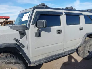 2003 Hummer H2 with VIN 5GRGN23U13H128617, listed as a IAAI auction lot 41494349 with 135,295 mi miles. Bid and sale history available at carsss.com. Image 14.