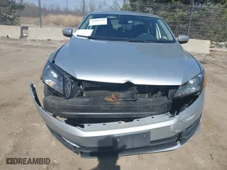 2013 Volkswagen Passat SE w/Sunroof & Nav with VIN 1VWBH7A33DC145554, listed as a IAAI auction lot 41808150 with 142,051 mi miles. Bid and sale history available at carsss.com. Image 6.