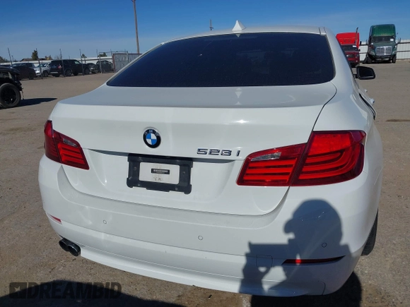 2013 BMW 5 Series 528i with VIN WBAXG5C59DDY32432, listed as a IAAI auction lot 41230673 with 103,069 mi miles and . Bid and sale history available at carsss.com. Image 17.