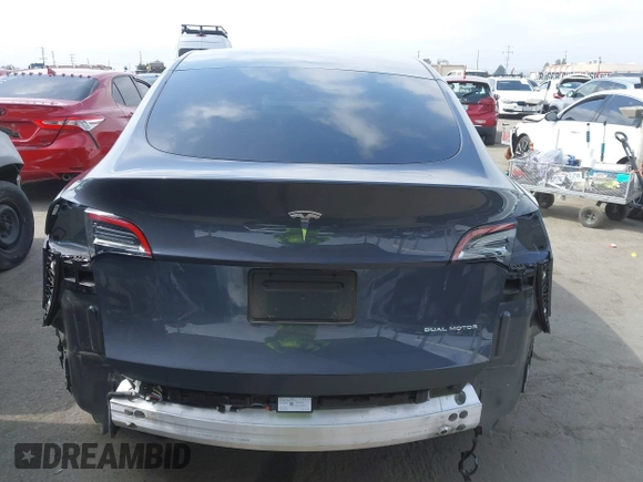 2022 Tesla Model Y Long Range z VIN 7SAYGDEE6NF364994, wystawiony jako IAAI lot #42322587 z przebiegiem 41 572 mil mil oraz . Historia ofert i sprzedaży dostępna na DreamBid. Obrazek 17.